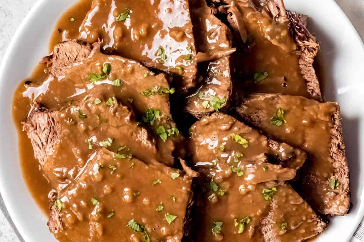 A mouthwatering plate of roast beef with German gravy.