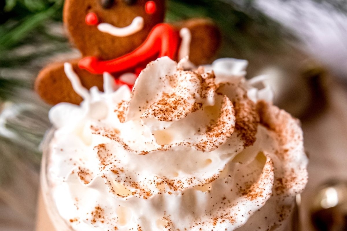 Starbucks holiday recipe: A gingerbread latte with whipped cream and a gingerbread man topping.