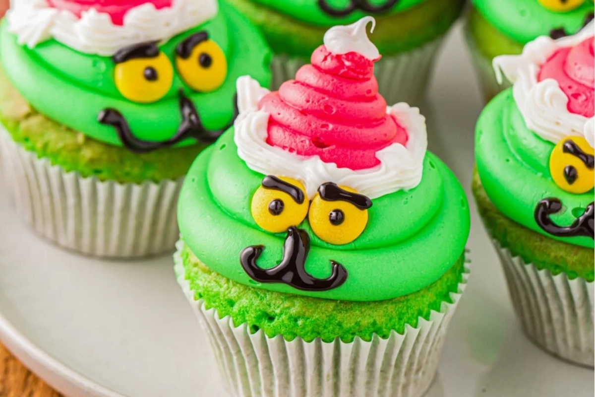 Cute Christmas cupcakes with Santa hats and mustaches.