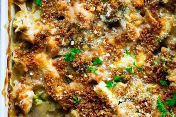 A casserole dish with broccoli and cheese.
