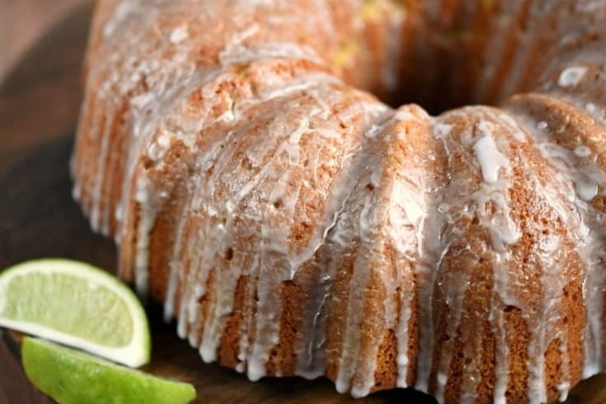 A bundt cake with lime slices and icing. The perfect treat for any occasion.
