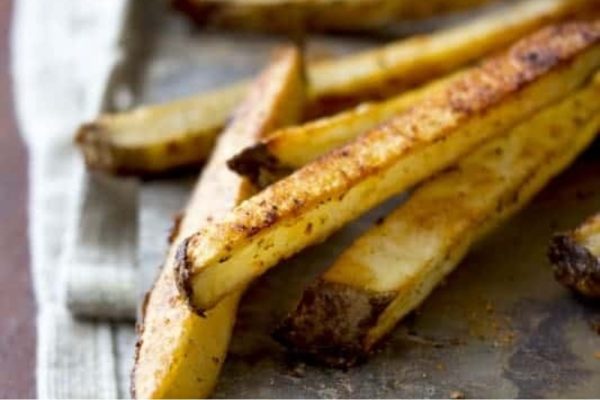 Parents love these kid-friendly recipes that feature French fries served on a plate with a napkin.