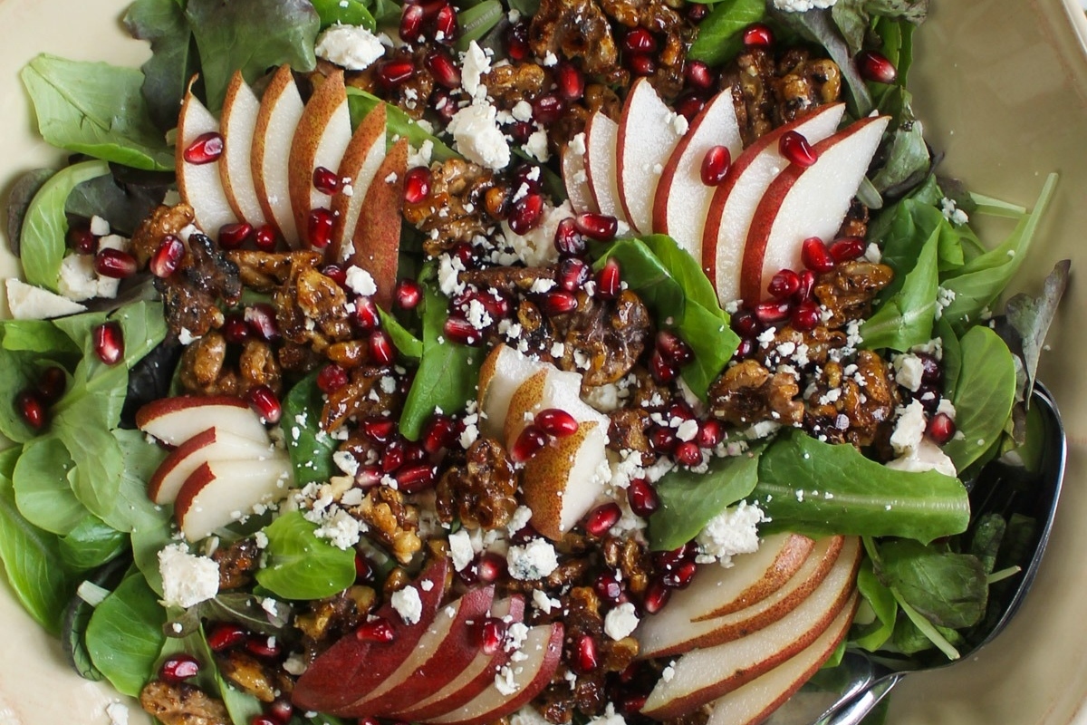 A refreshing salad recipe with pears, walnuts and a hint of tangy pomegranate.