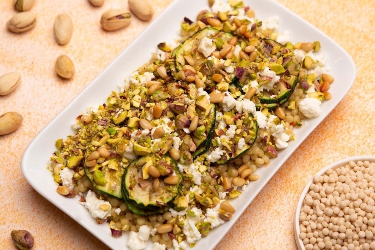 Discover a flavorful and nutritious dish that combines the delightful taste of pistachio and zucchini in a delectable couscous. This mouthwatering recipe is enhanced with the tangy creaminess