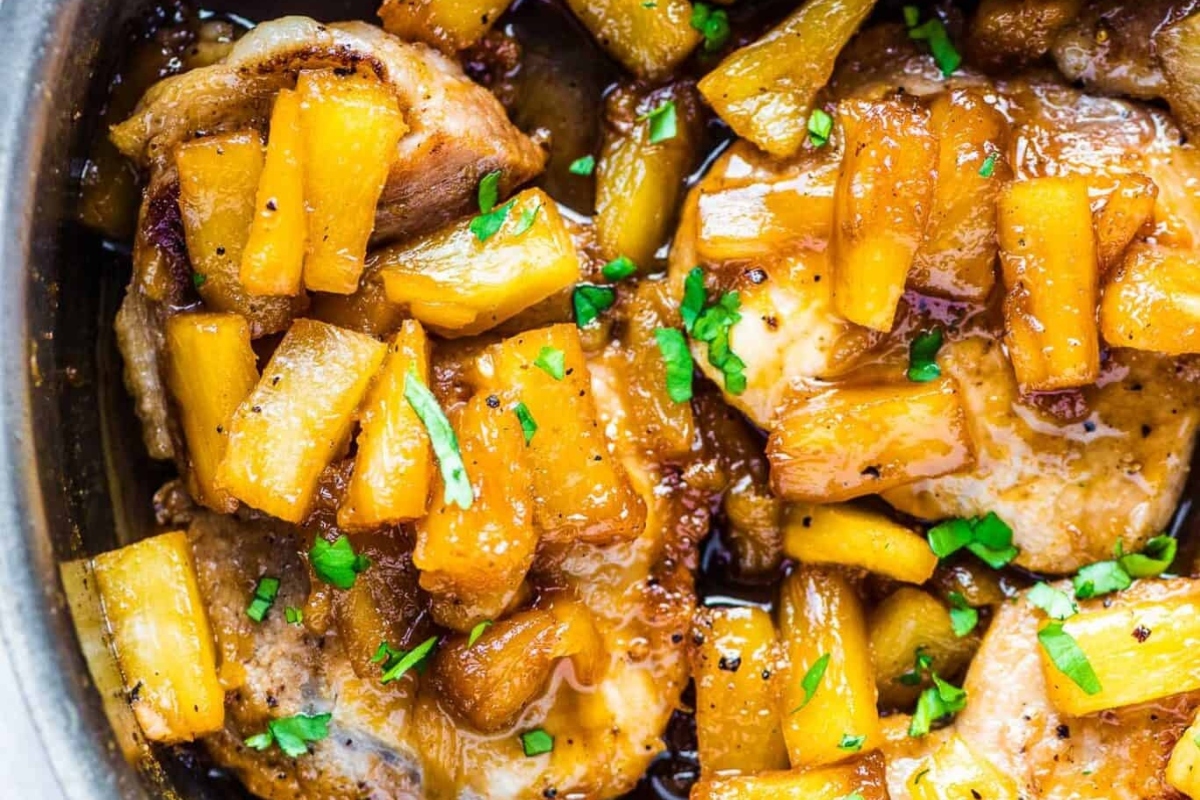 Pork dinners: Enjoy deliciously cooked pork chops in a skillet, paired with the perfect combination of flavorful apples and pineapples.