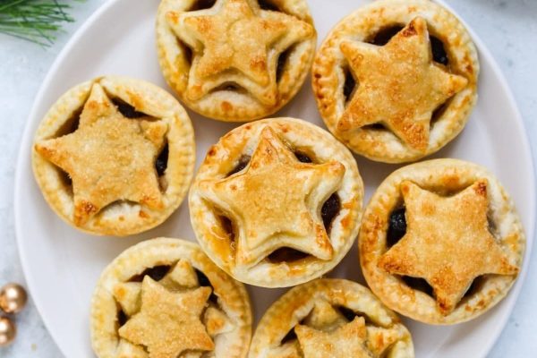 Star shaped christmas pies on a plate.