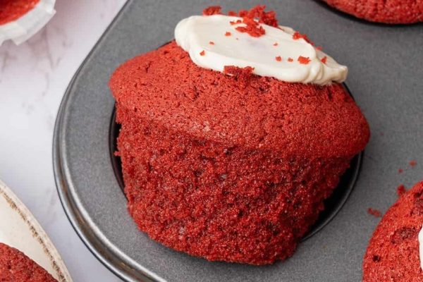 Red velvet cupcakes with cream cheese frosting are a delicious and indulgent dessert option. The red velvet flavor adds a touch of luxury to these bite-sized treats, while the cream cheese frosting provides a creamy and