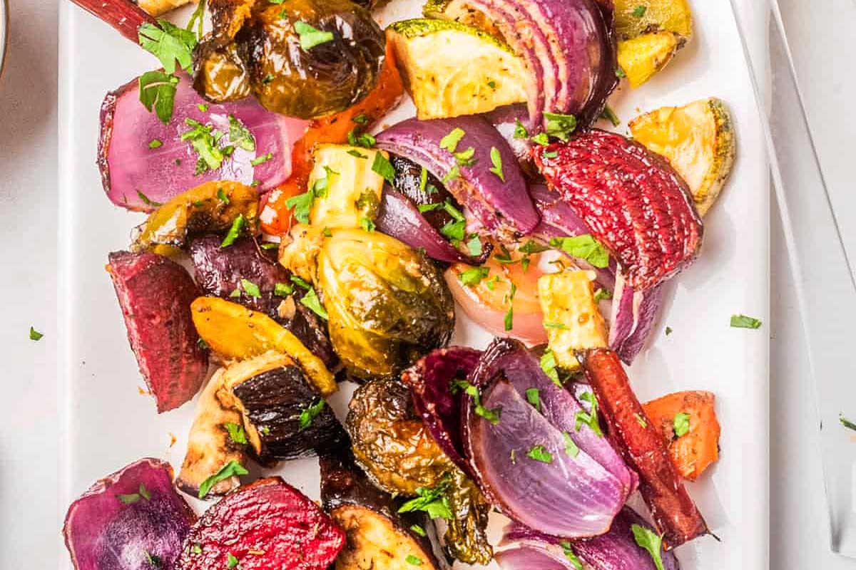 Roasted vegetables on a white plate.