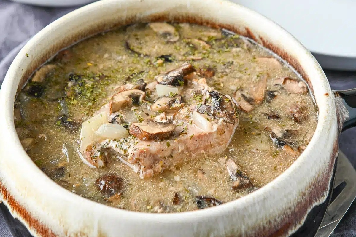 A delicious slow cooker soup with meat and mushrooms.