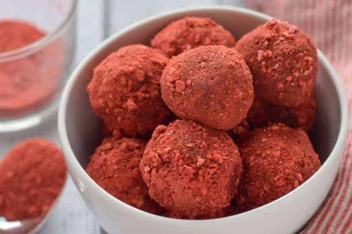 No Bake Red velvet truffles in a white bowl.