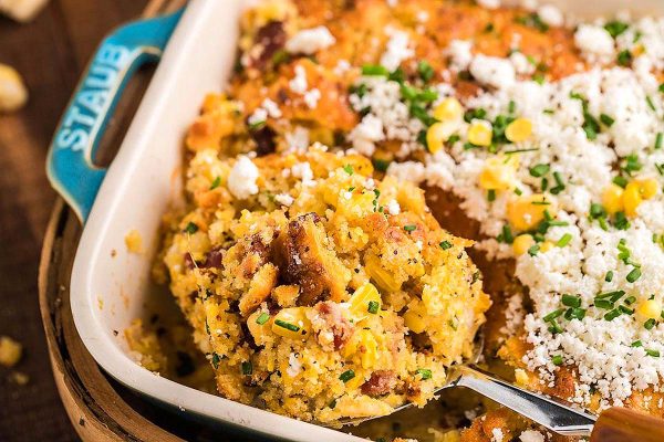Cheesy corn casserole served as a delicious side dish for turkey.