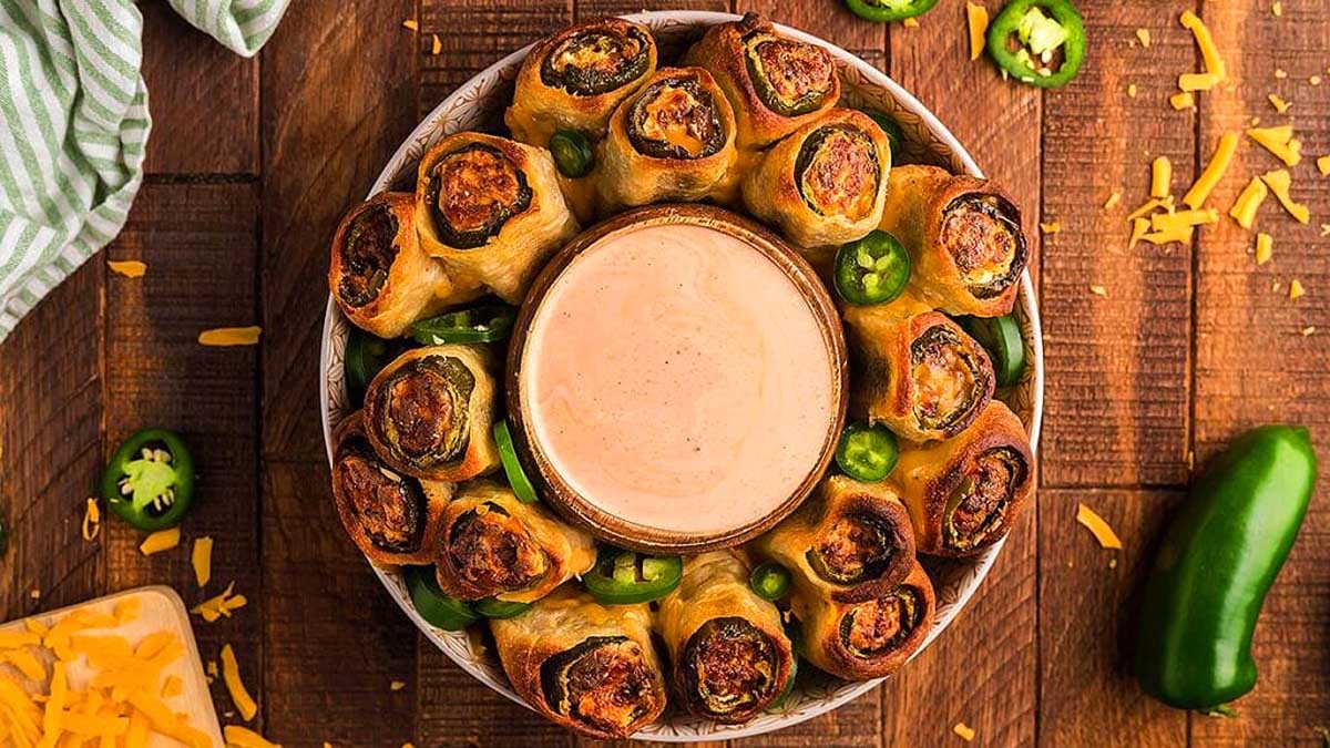 A festive plate of jalapeno cheese dip, perfect for Christmas party appetizers.
