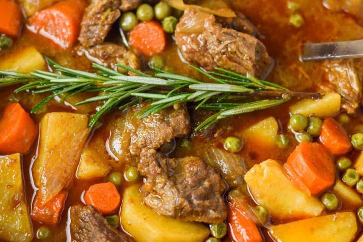 A comforting winter dinner, this stew features tender meat, hearty potatoes, carrots, and a touch of fragrant rosemary.