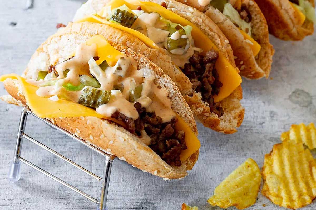 A stack of tacos on a rack.