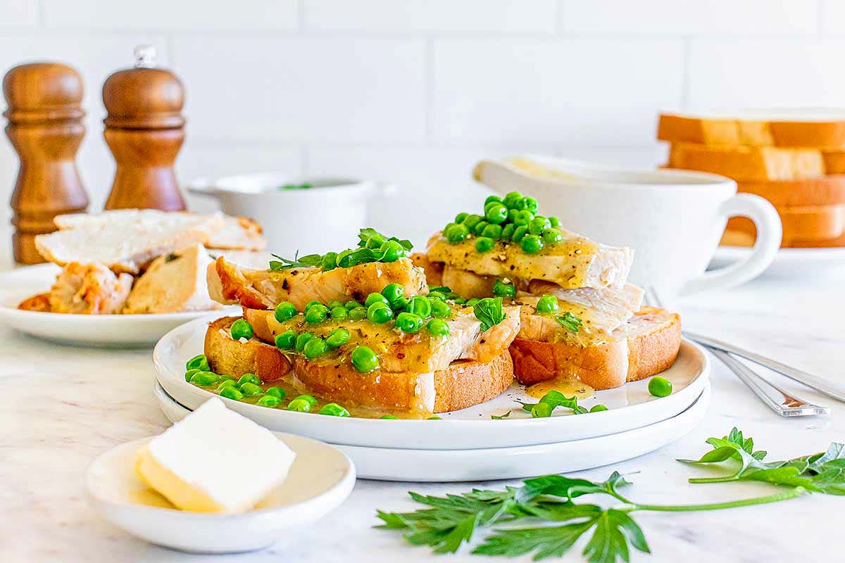 A plate of bread with peas, butter, and Canadian recipes.