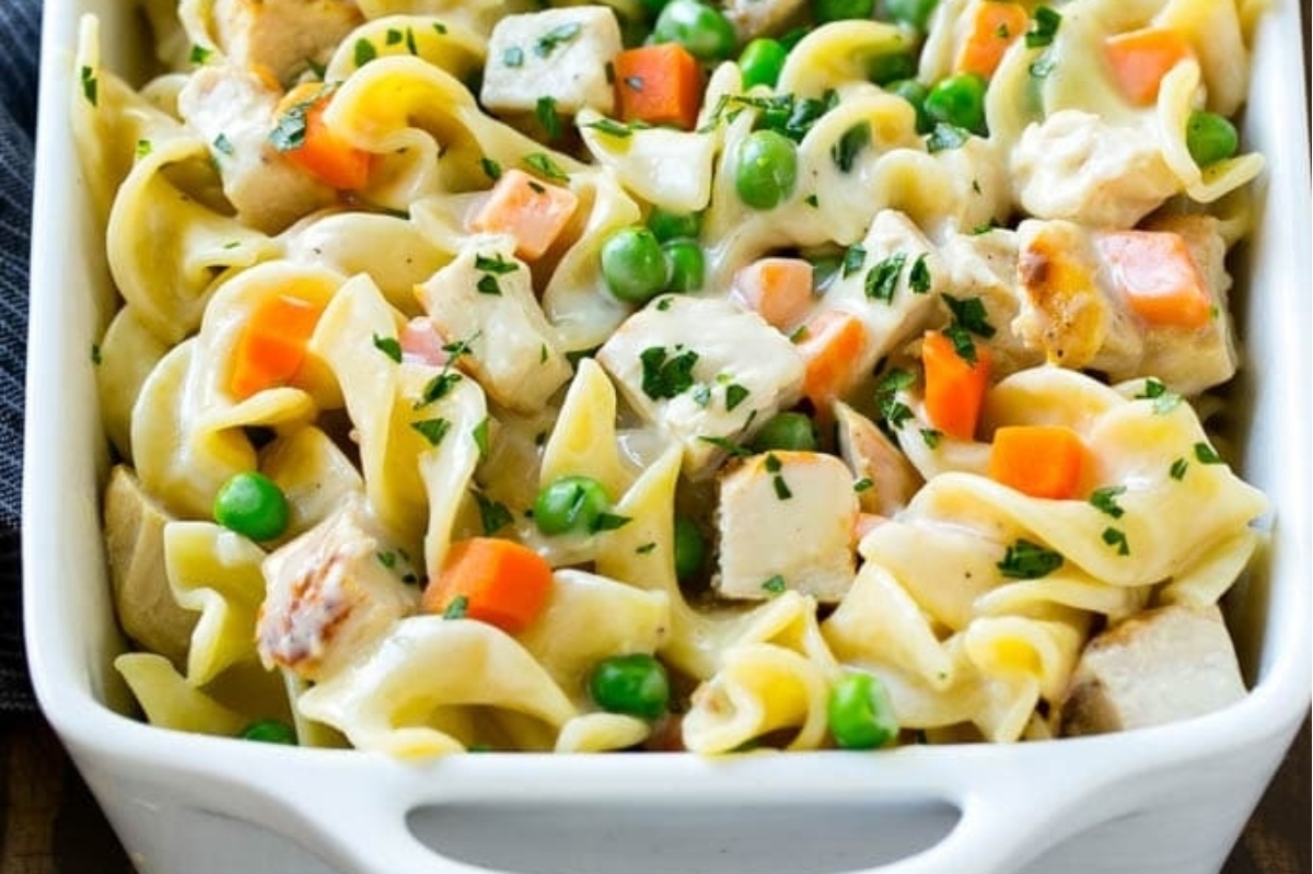 Chicken noodle casserole with peas, carrots, and frozen mixed vegetables.