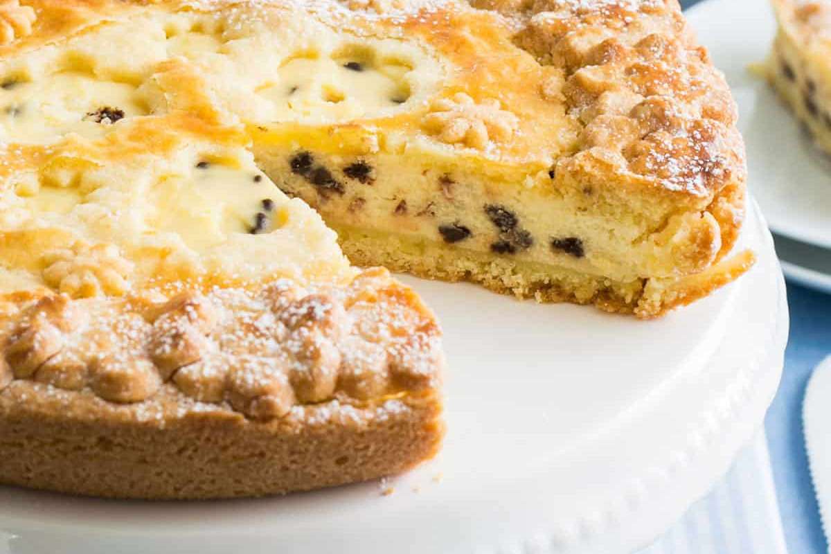 34 Italian Dessert Recipes For a Taste of La Dolce Vita 19 An Italian dessert cake with a slice taken out of it.