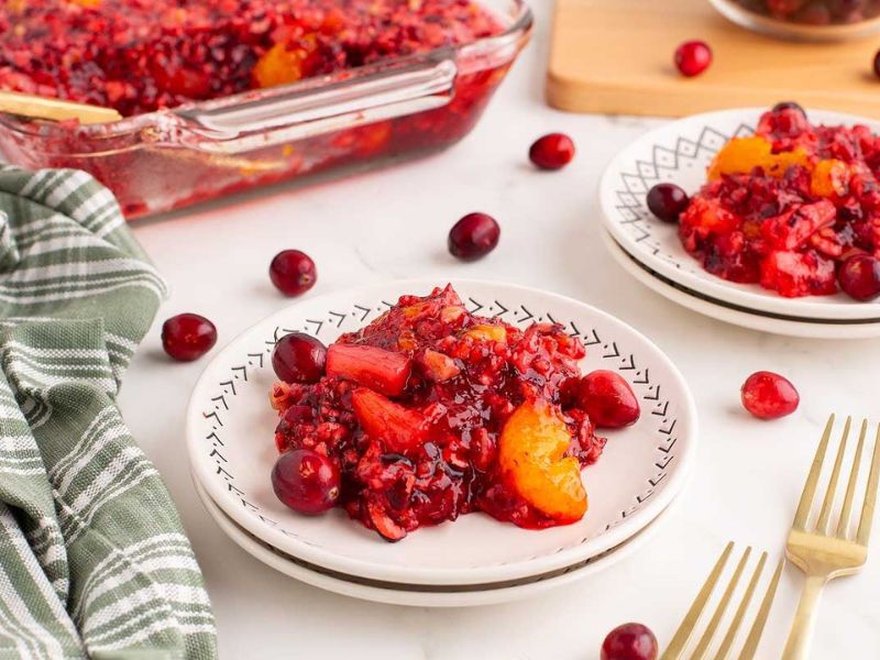 Cranberry risotto recipe with cranberries on a plate.