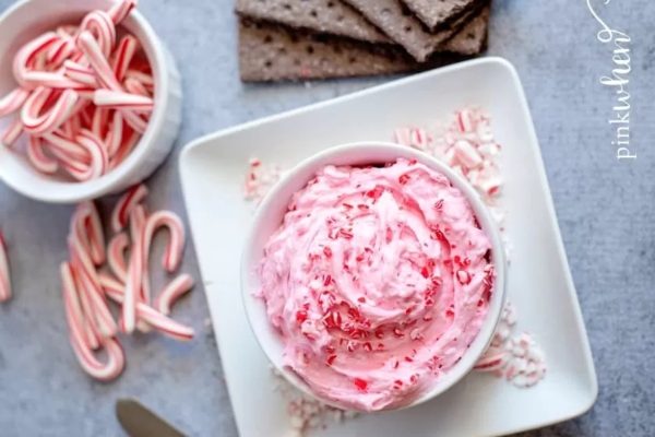 Candy cane dip with crackers and candy canes.