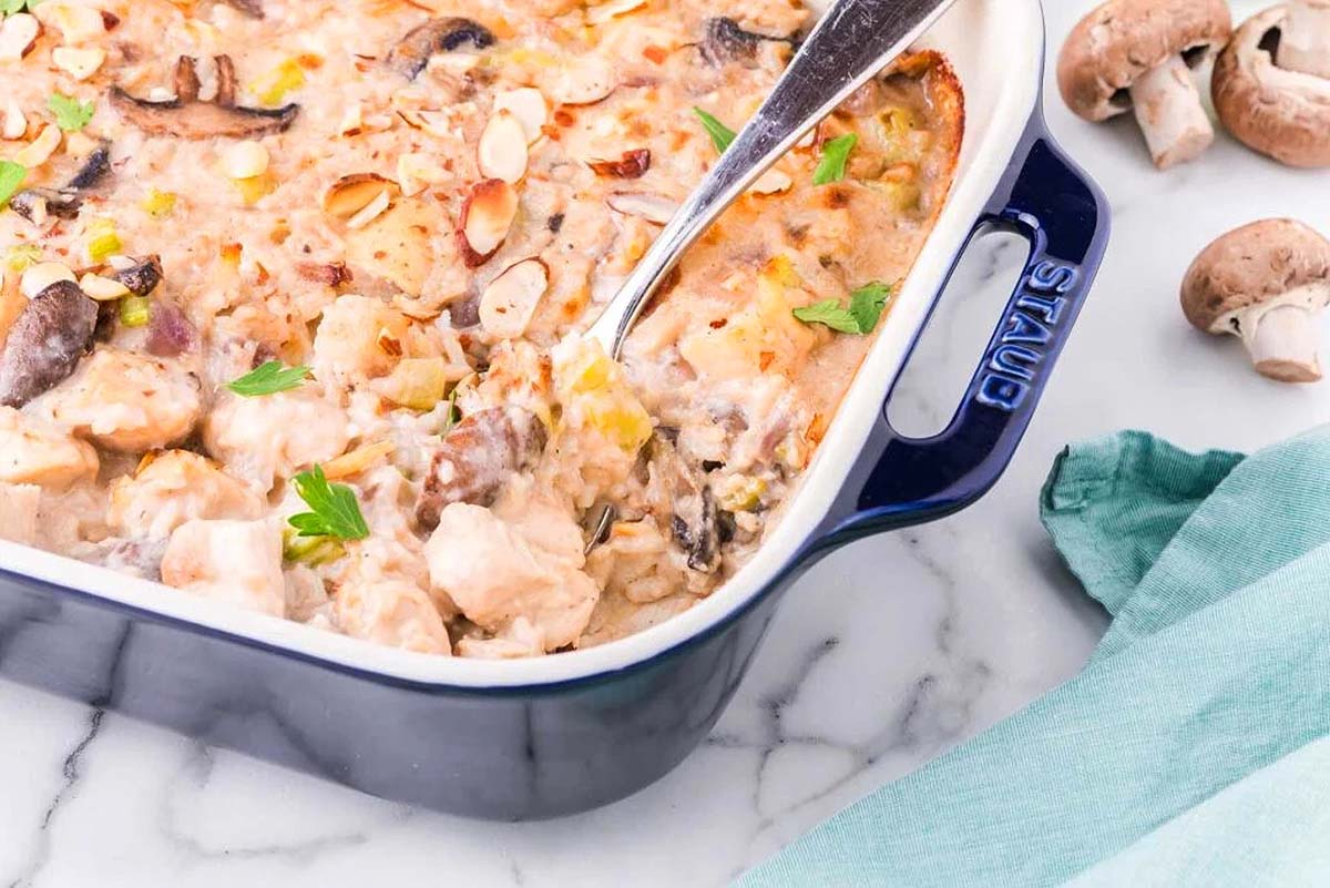 A flavorful casserole dish showcasing tender chicken and earthy mushrooms.