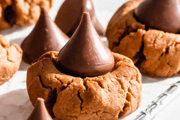 Peanut butter cookies with chocolate kisses on top.