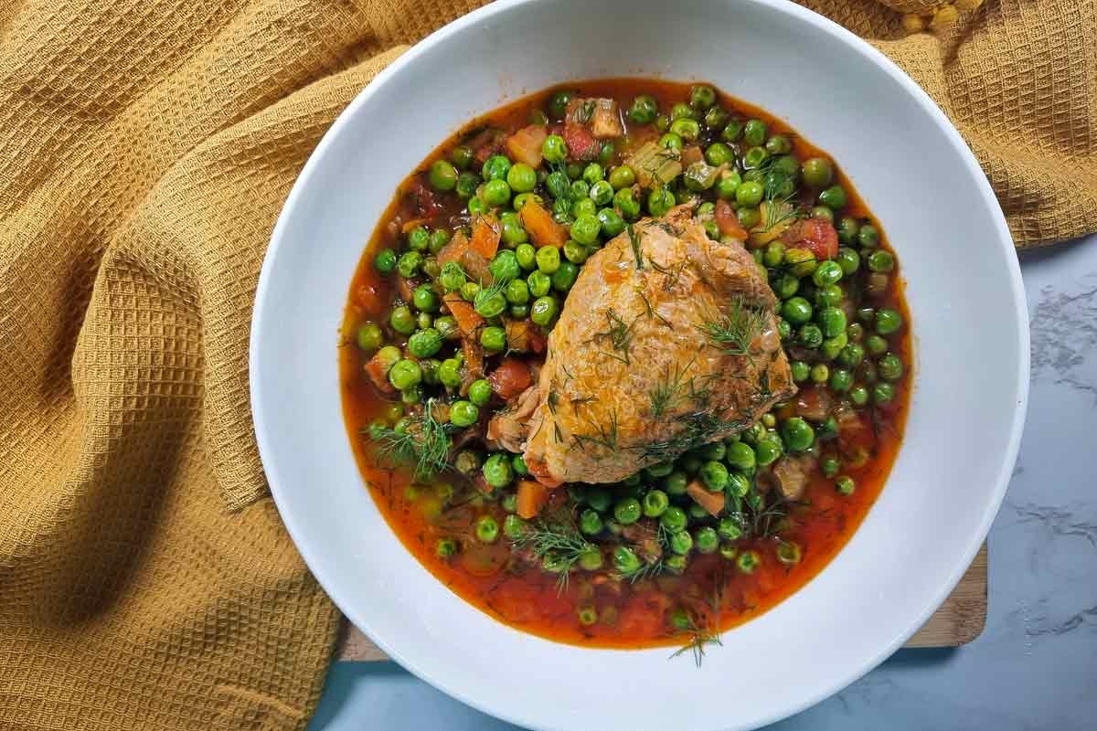 A flavorful recipe for chicken stew packed with frozen peas and carrots.