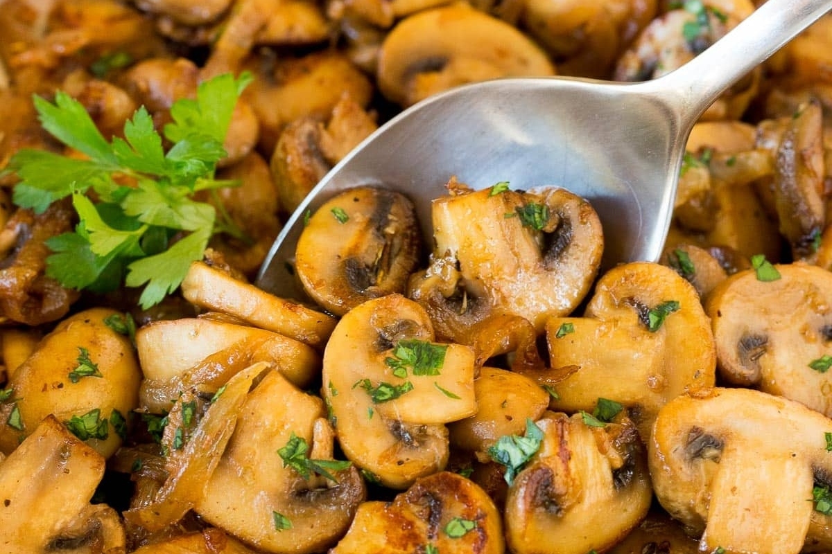 A delectable side dish consisting of mushrooms sautéed with parsley and garlic.