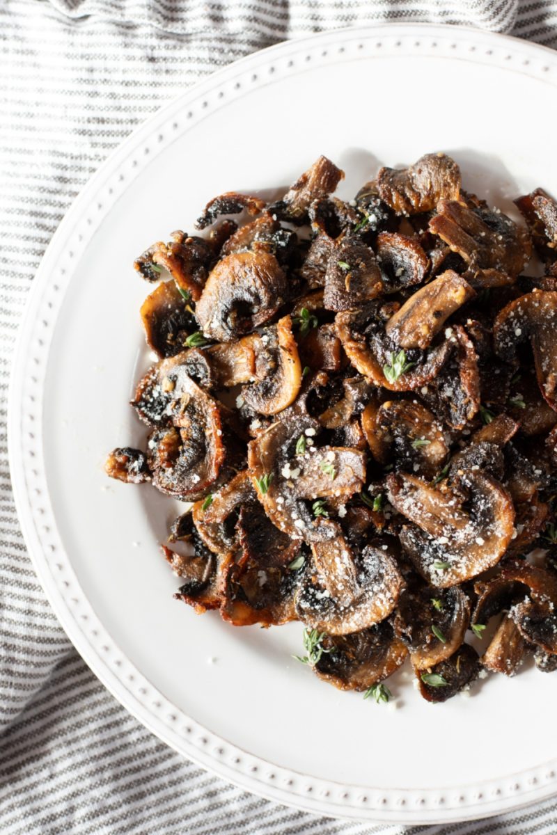 Roasted air fryer mushrooms on a white plate.