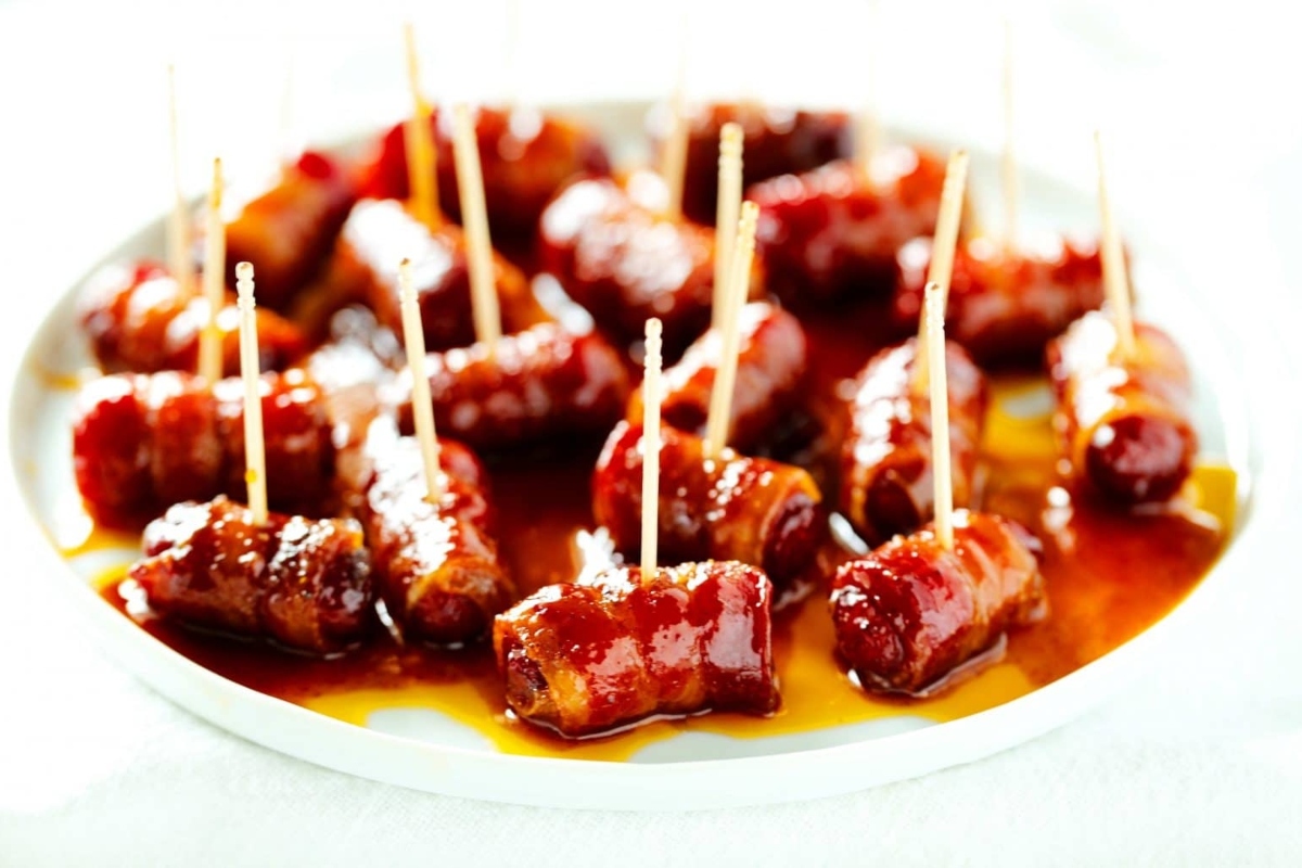 48 Easy Bite-Sized Appetizers Party Guests Will Love 31 Bacon wrap with sticks.