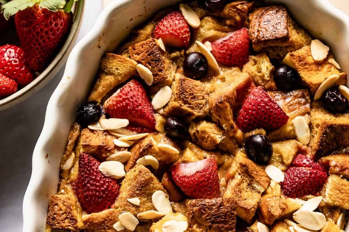 A sweet dish of bread pudding with berries - perfect for Christmas breakfast!