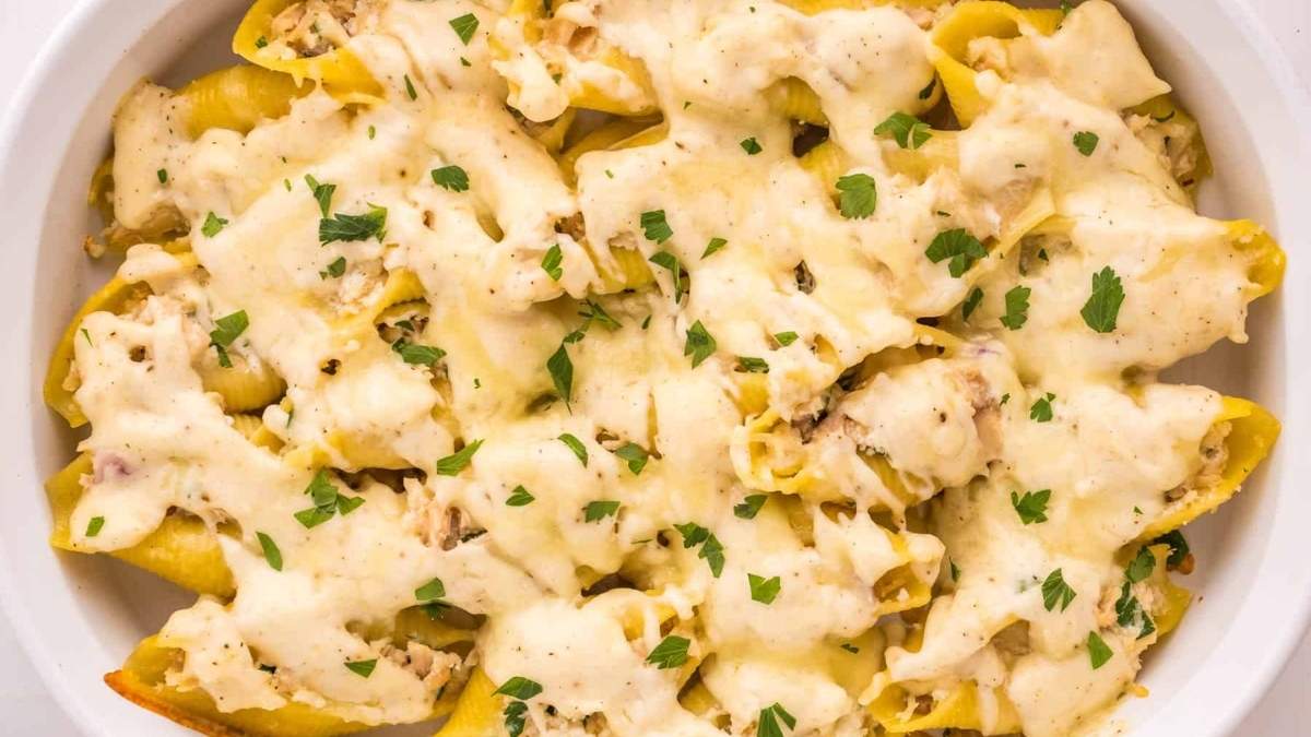 Cheesy chicken stuffed shells, a comforting and delicious dish perfect for any shared dinner or round-up of comfort food recipes.