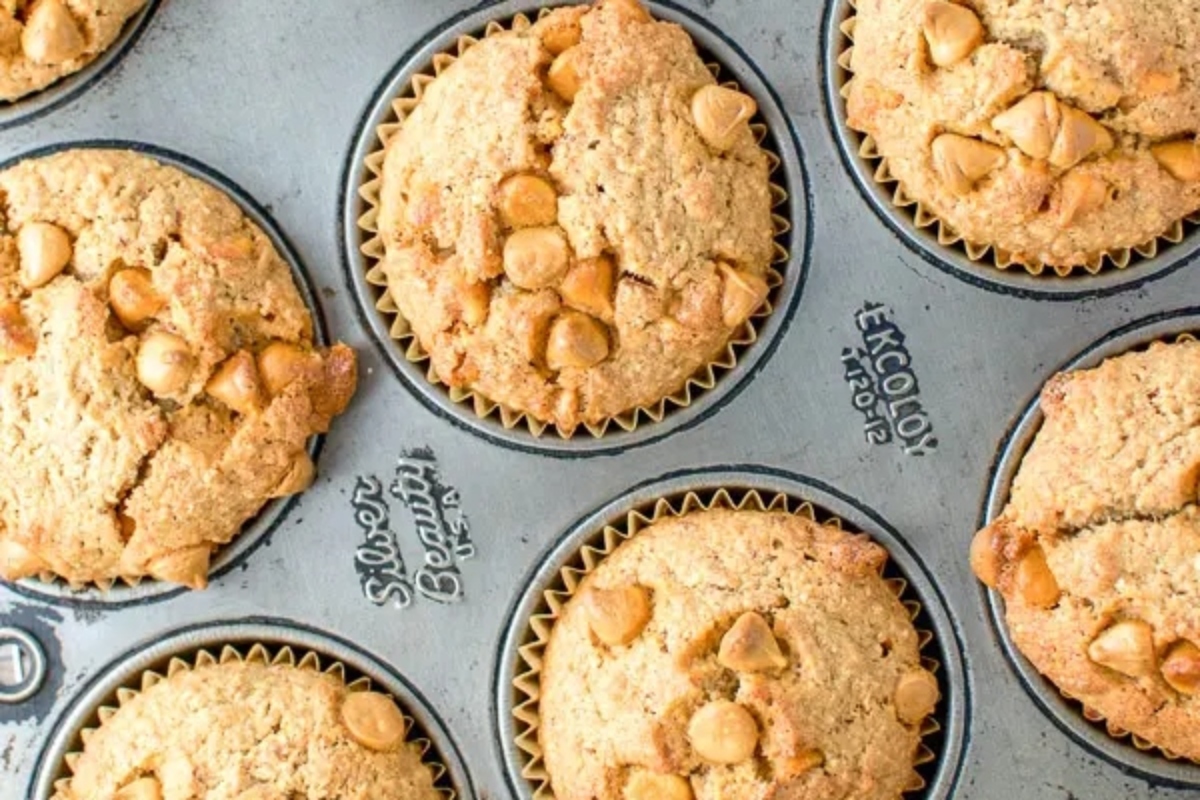 Easy breakfast recipe for peanut butter muffins in a muffin tin.