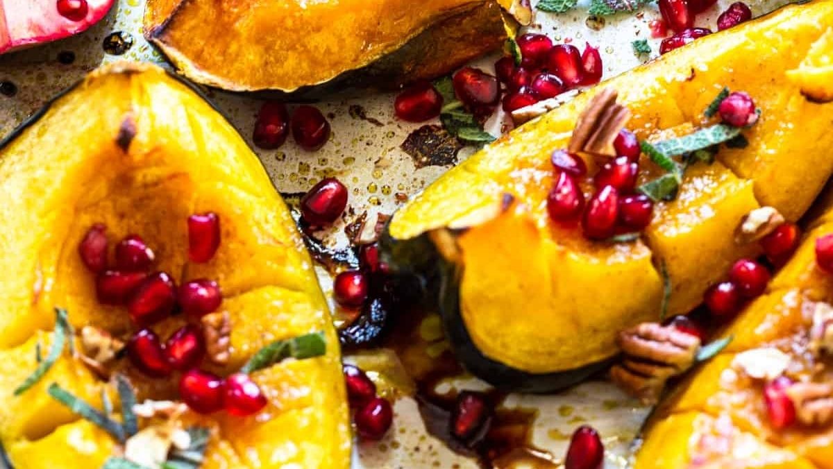 Christmas-inspired side dish that combines the natural sweetness of roasted acorn squash with the vibrant tanginess of pomegranate and pomegranate seeds.