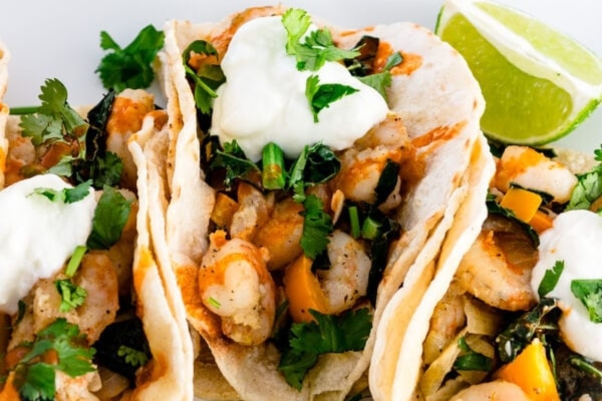 Shrimp tacos with sour cream and lime are the perfect addition to your Taco Night dinners.