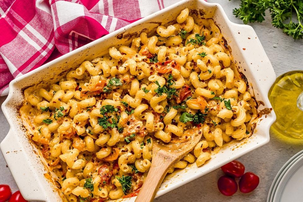 A make ahead pasta dish of macaroni and cheese with tomatoes and herbs.