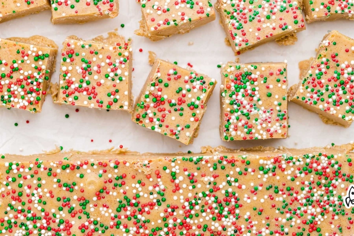 A festive piece of peanut butter fudge covered in Christmassy sprinkles.