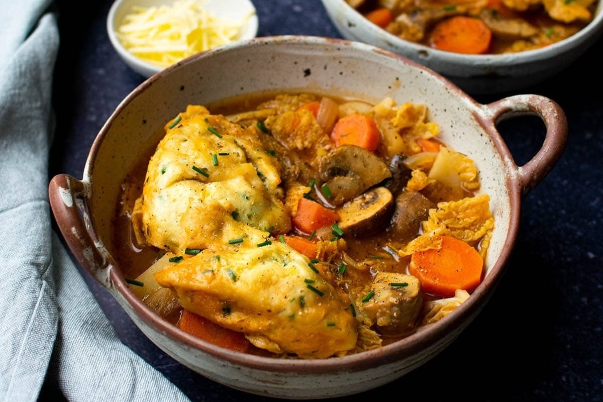 Chicken and mushroom stew - a comforting dish served in a bowl that combines the succulence of chicken with the earthiness of mushrooms. This hearty recipe is perfect for those looking to indulge in delicious stew recipes