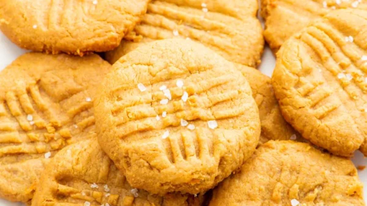 Best Cookie Recipes for Mother's Day 36 Peanut butter cookies on a shared white plate.