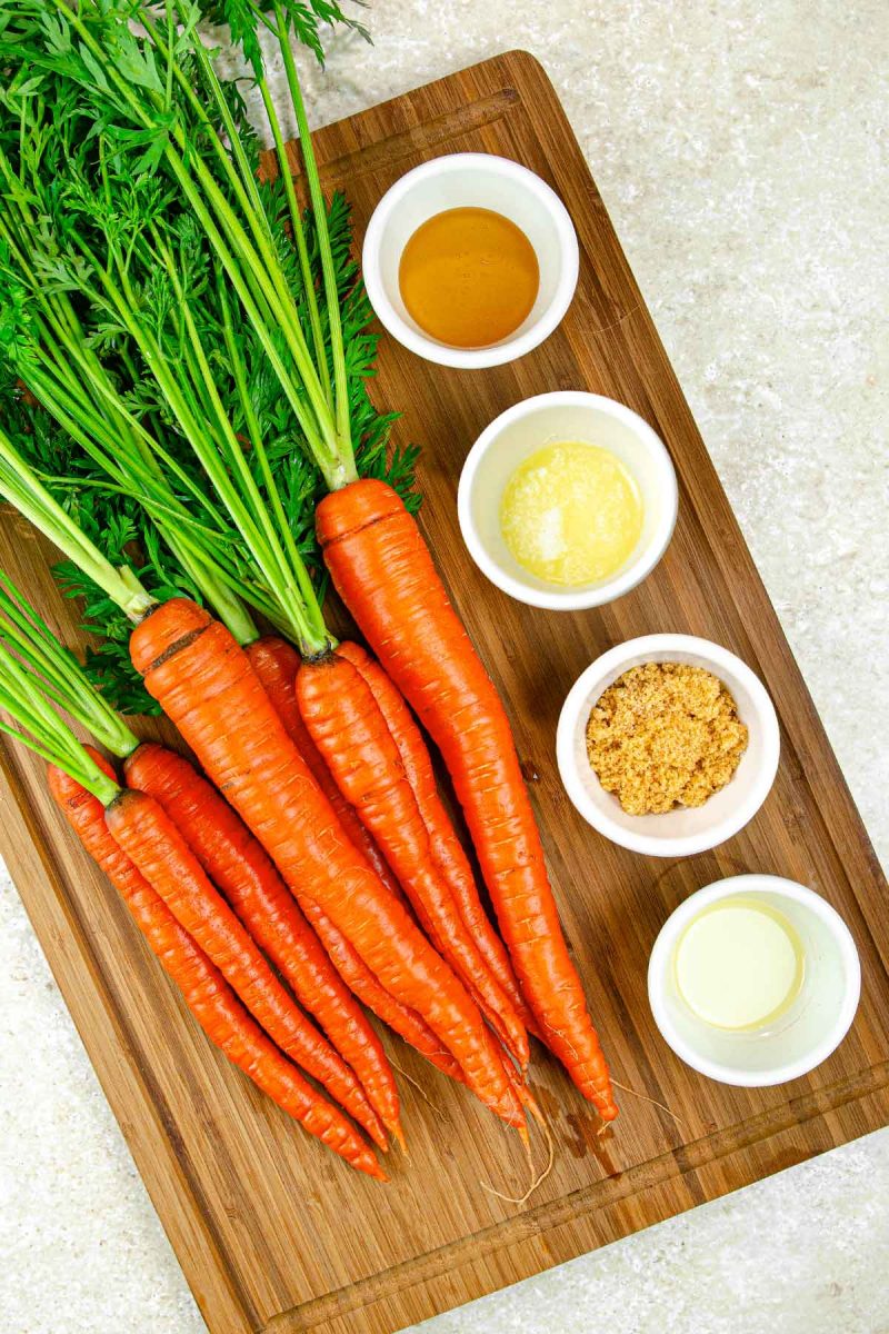 A versatile wooden cutting board, perfect for chopping fresh vegetables for your air fryer carrots.