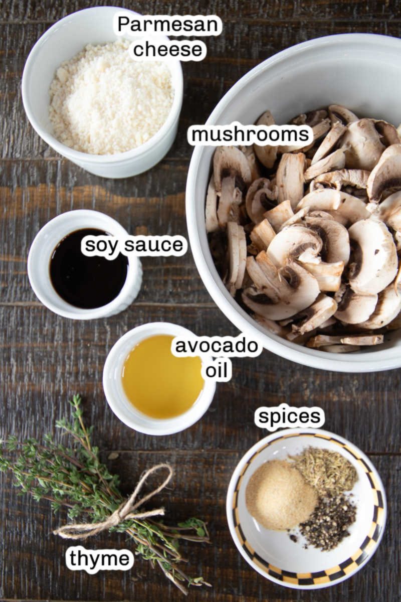 Ingredients for mushroom risotto on a wooden table, made with air fryer mushrooms.