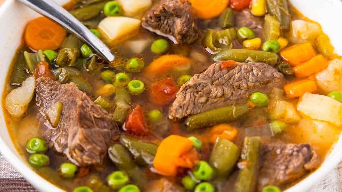 Winter Soup Recipes to Warm You Up 14 Vegetable soup with peas and carrots.