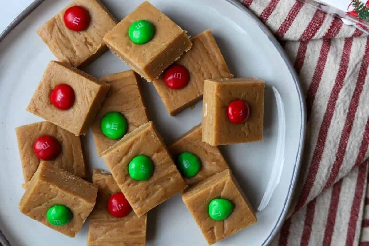 Christmas recipe: Peanut butter fudge with festive green and red candy canes, elegantly plated.