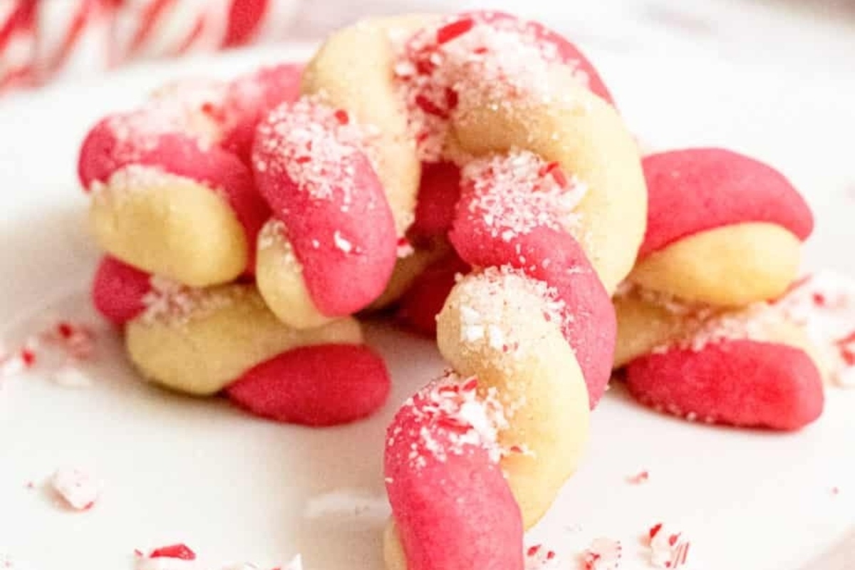Delicious candy cane cookies arranged beautifully on a white plate.