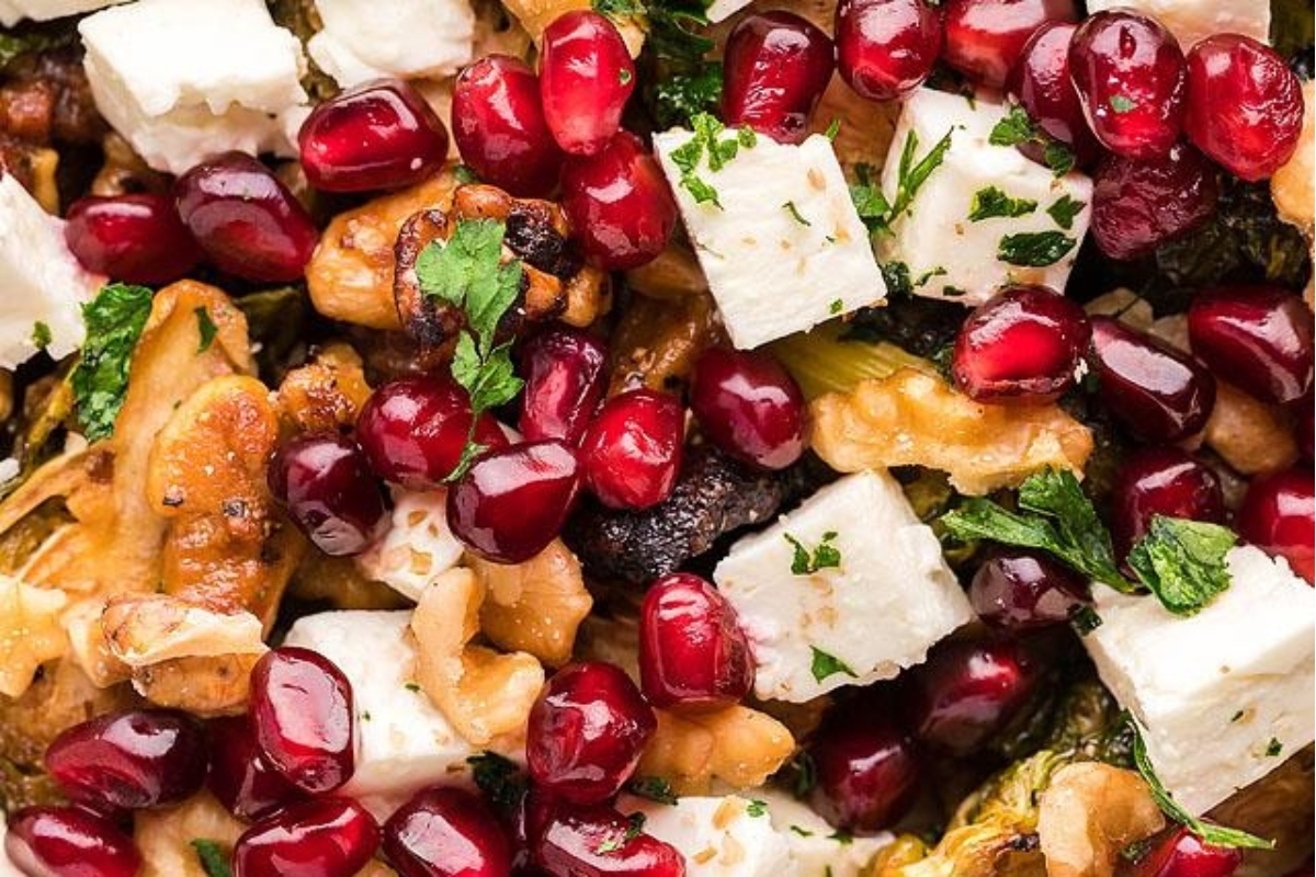 A festive Christmas side dish featuring the delightful combination of pomegranate, walnuts, and feta cheese.