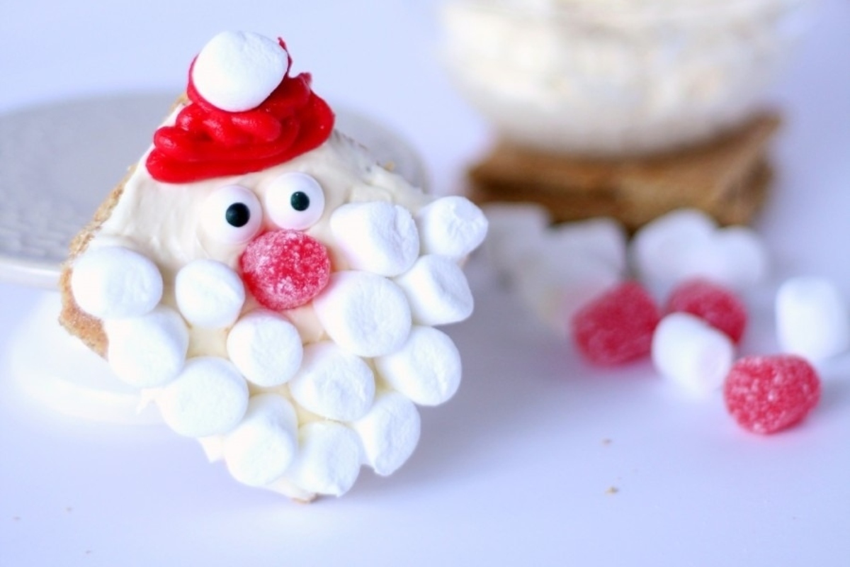 A themed Santa Claus cookie recipe with marshmallows on top.