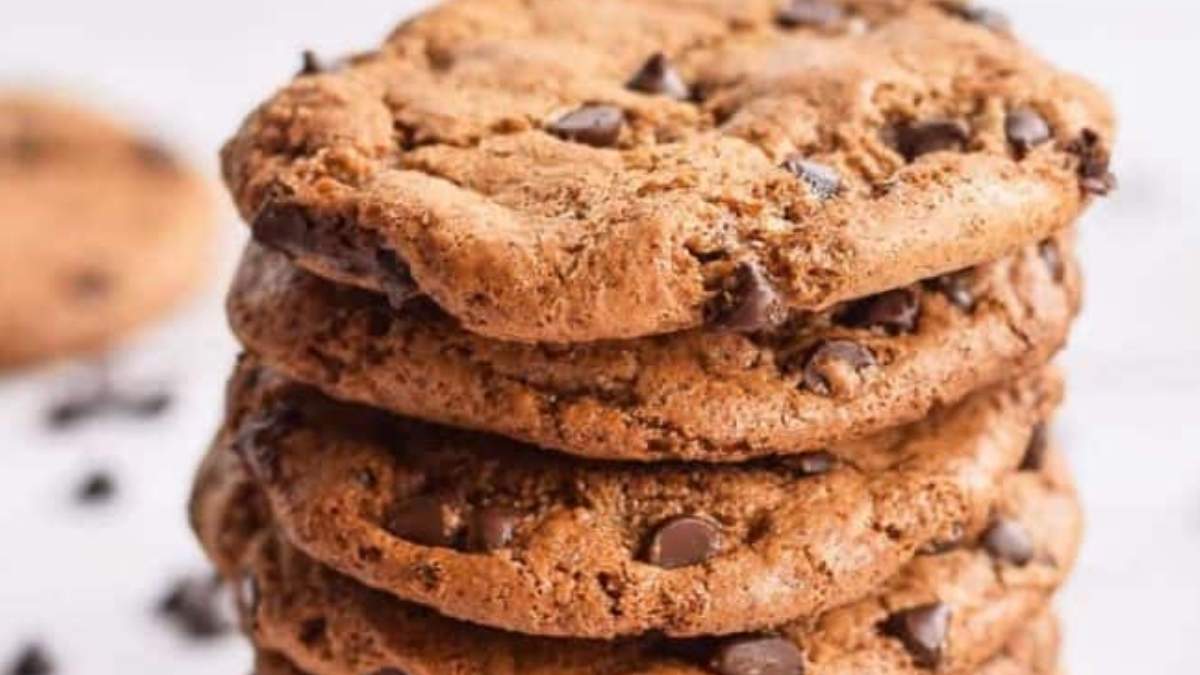 A shared roundup of cookie recipes featuring a stack of chocolate chip cookies on a white background.