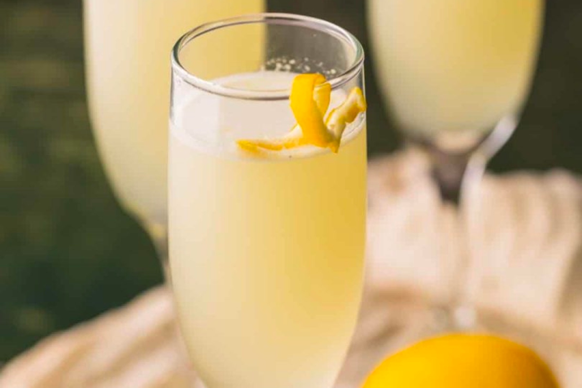 Three glasses of lemonade on a napkin, perfect for refreshing cocktails.