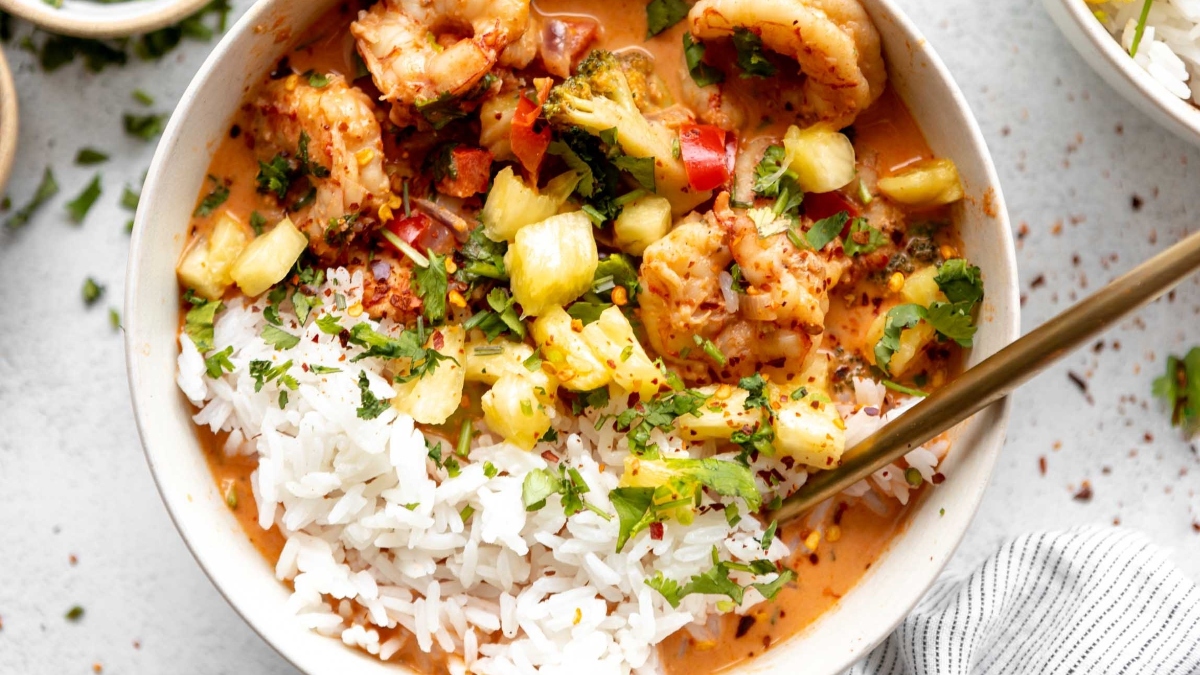 A bowl of shrimp and vegetable rice.