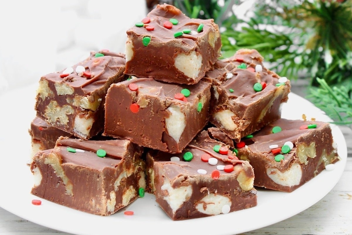 A mouthwatering pile of Christmas fudge on a plate.