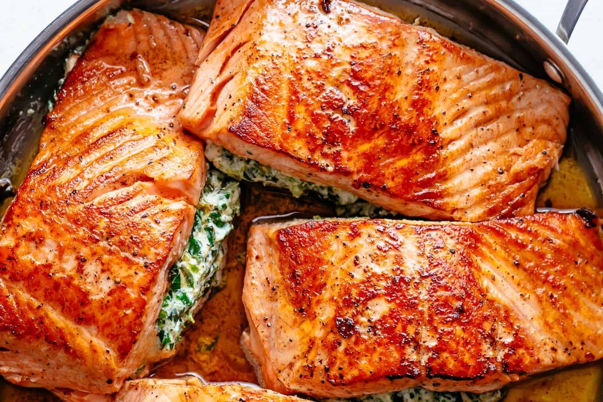 Spinach and salmon fillets come together in a delicious skillet recipe.